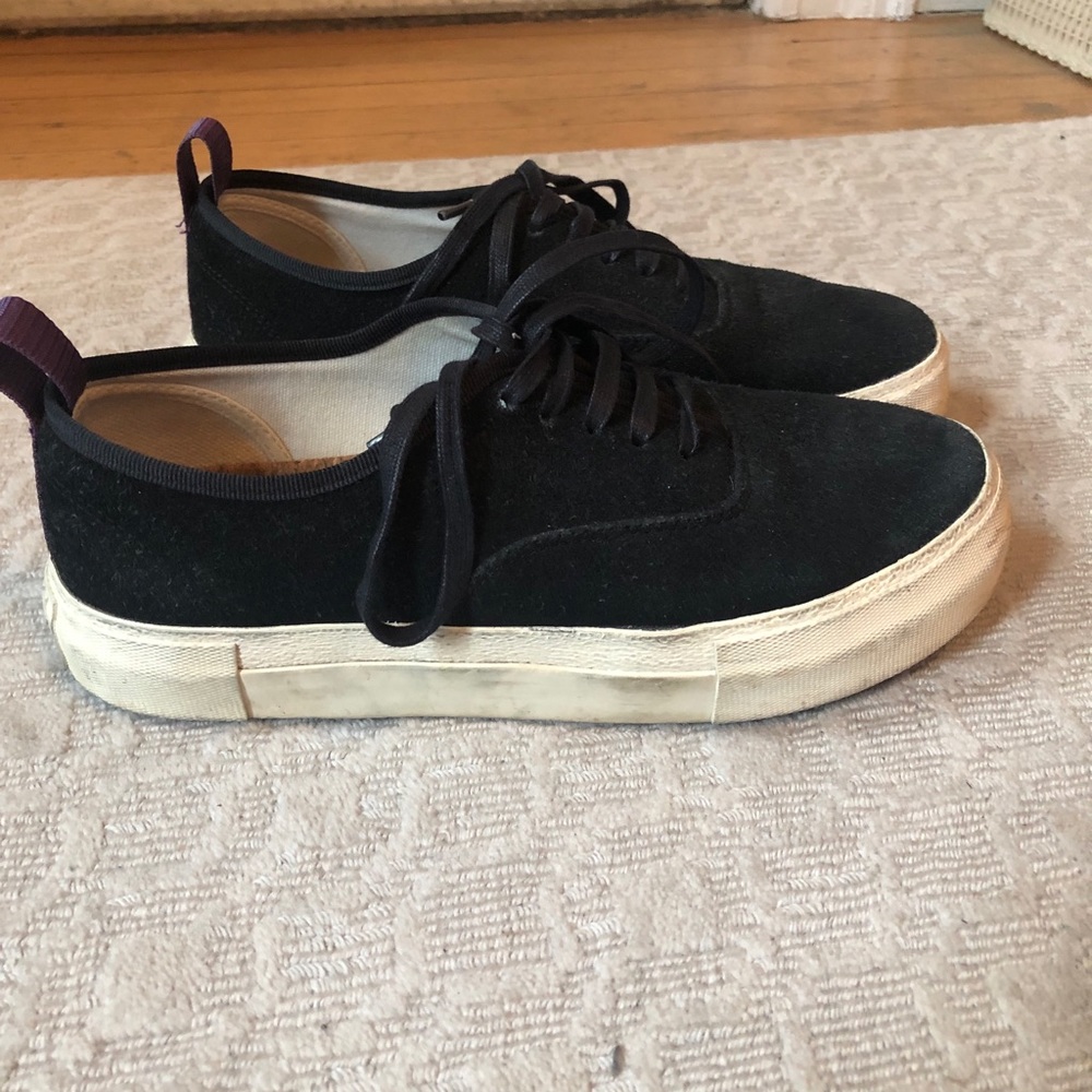 Black platform sneakers